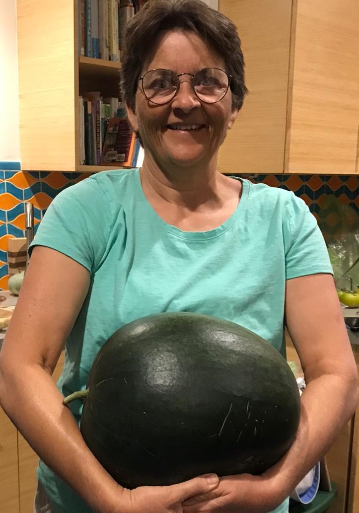 Sarah with watermelon grown in Los Angeles
